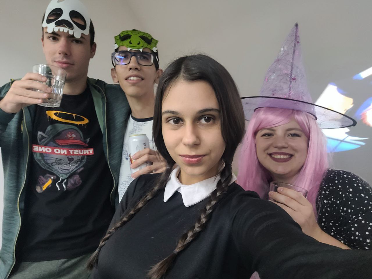 Costume group featuring Wednesday, witches, and drinks